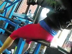 Sporty girl in red old mothers black pants