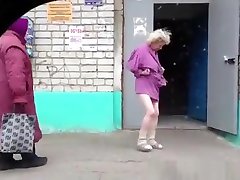 Older drunk woman shows ass and tits