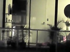Woman spied through her apartment window