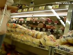 Teen girl in tight jeans buying food