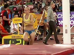 Sexy sportswoman with a big butt does pole vaulting