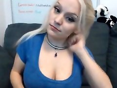 Busty blonde babe dildoing pussy on cam