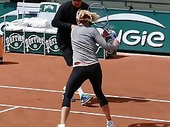 Leggy tennis babe practices in tight birth man pants