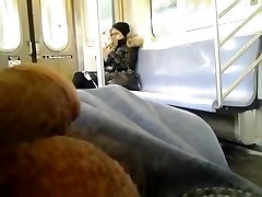 Stroking cock to the hot blonde on the subway