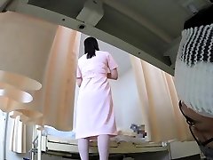 Japanese MILF in body oil massager action in the office