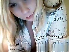 Sexy blonde plays with her tits on cam