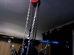 Hanging bondage in full rubber