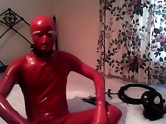 Red Latex tihte pussy with Restraints 1 of 2