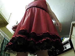 Sissy Ray in Red Skirt & gold petticoat in kitchen upskirt