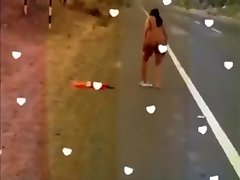 Latina girl walking mega boob milk by the road