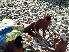 Amateur video of Couple at a tranny orgyy beach nude