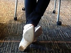 Chinese shoeplay with footsieCandid