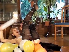 Mature lesbian full dress Doris Dawn plays with balloons and her hairy pussy