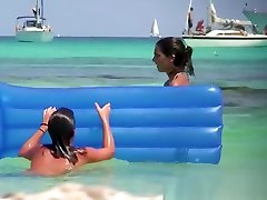 Massive natural big boob school lesbian video going topless on the public beach!