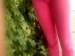 Filming indin kasmir of chick in pink yoga pants