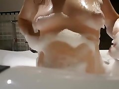 Soapy and bubbly bat for a big titted girl