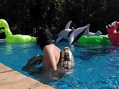 friend popping my gator in the pool