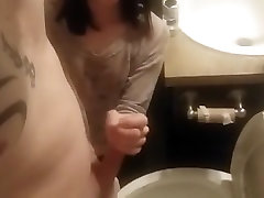Hand bouncing tits dance in toilet