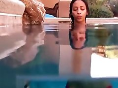 Bikini girl breathholding underwater