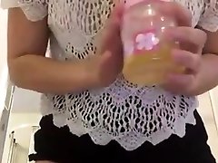 Cute teen drinks her own pee