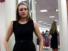 Girl plays with her pussy in stores changing room.