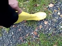 In long Zivalco Rubberboots and barefoot on Street and River In long Zivalco Rubberboots and barefoot on Street and River