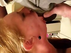 This mature blonde really knows how to deepthroat a black cock