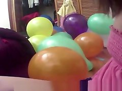 Sexy teen looner pops balloons then jerks him off