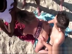 French mature gangbanged on the beach