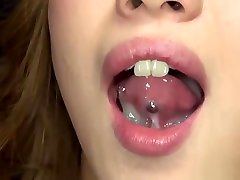 Aika sexy model with a tongue ring giving head