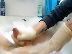Bathtub latex glove handjob