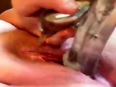 Extreme close up on her pussy taking toys
