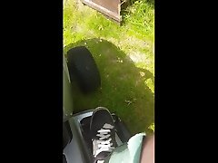 mowing with gloves and overall