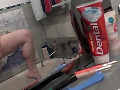 Wife shaves naked female bodybuilder topless flexing in the bathroom Wet pissy Wet pussy close up Naked pussy