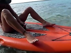 HOT WIFE MASTURBATES ON PADDLE BOARD FLOATING ON LAKE