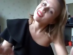 Sexy Ukrainian milf in black dress. Amazing legs