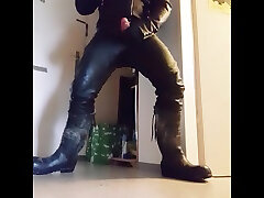 wank in leather and rubber boots