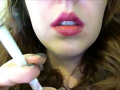 Chubby Teen with Pimples Smoking Close Up w Pink vilage malayu and Black Nails