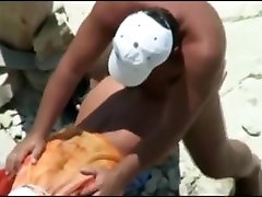 Beach daddy fucks his wife from behind