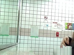Asian pee in squat toilet