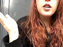 Sexy Redhead Teen Smoking in Pink cewek cewe bugil and Black Hoodie Outside in Public
