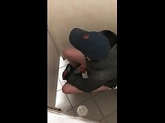 spy toilet jerking man