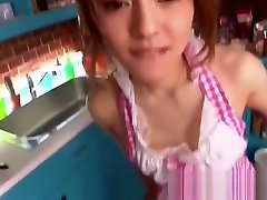 Japanese cutie gives a blowjob in the kitchen