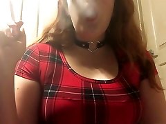 Sexy Redhead Goth Teen Smoking in Red Plaid Tight Dress and Leather Choker