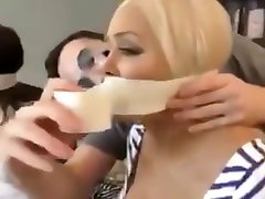 Two girls tied and gagged with tape