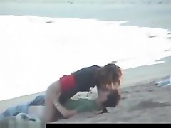Crazy couple fucking on beach