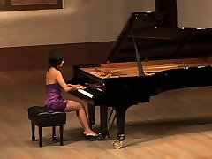 Beautiful Asian jil bab indonesia plays Russian composer Scriabin