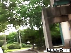 Shy Japanese schoolgirl filmed pissing loads outdoor