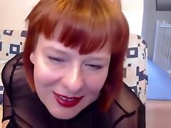 Spectacular redhead BBW yhai mom shows her huge boobs on cam