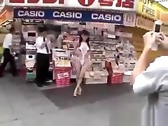 Walking semi-nude in Tokyo Streets